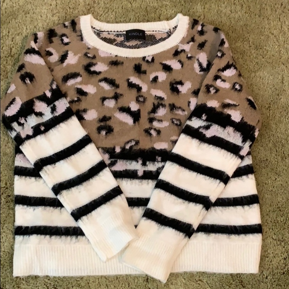 Like new. Black & white stripe with cheetah.